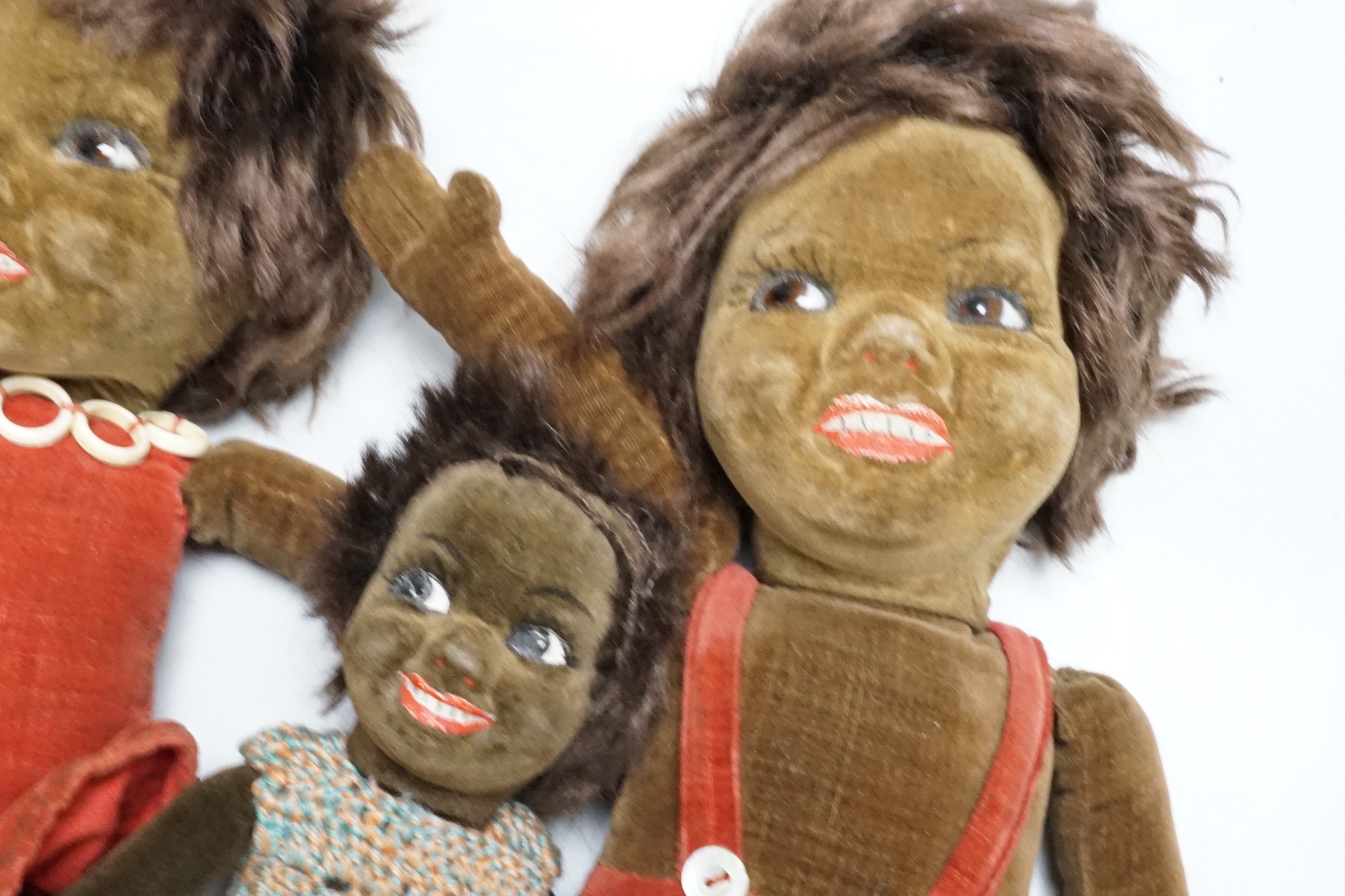 Five Norah Wellings soft toys including three South Sea Islanders, a sailor boy and a monkey, all with labels, monkey 23cm high